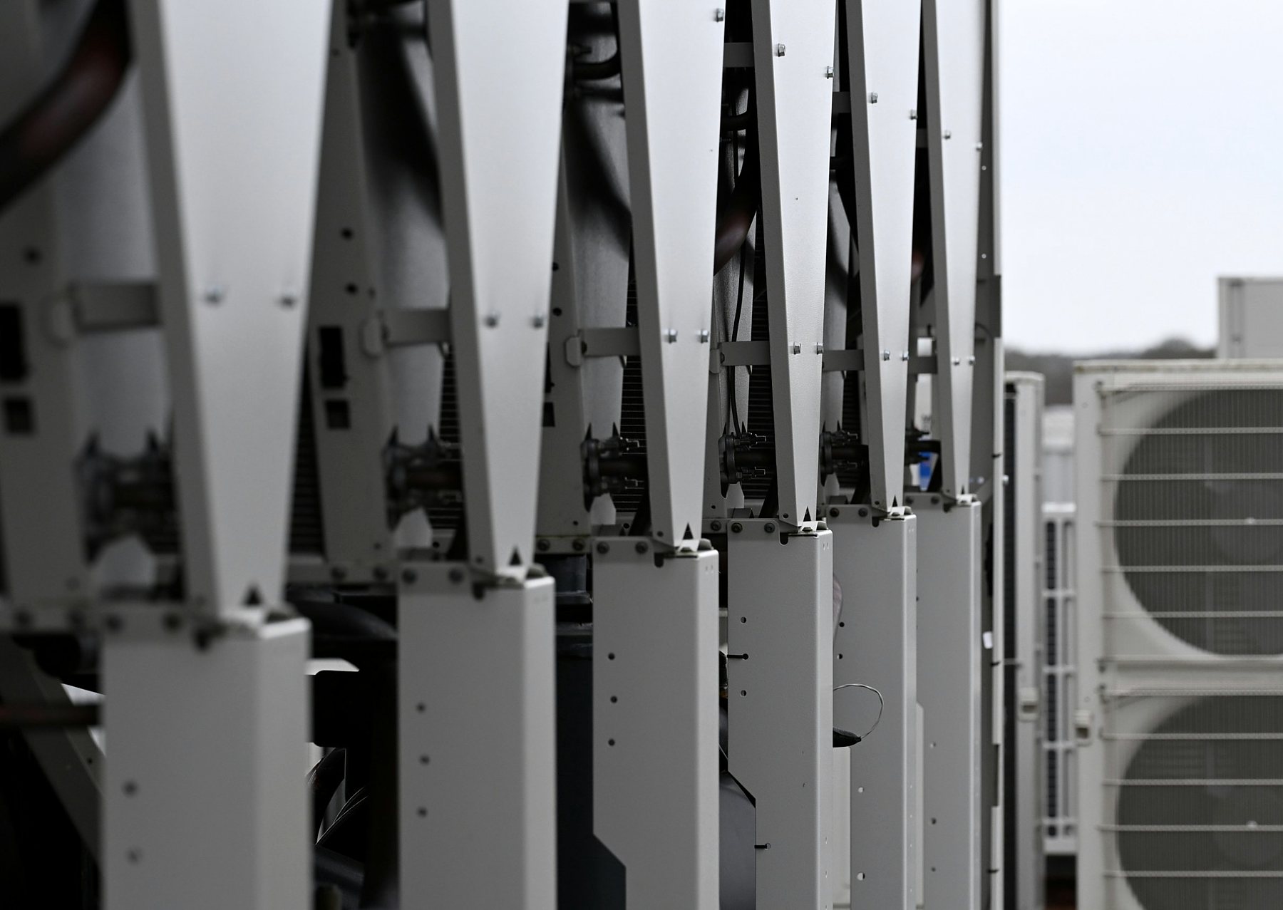 Rooftop HVAC condenser units on a commercial building
