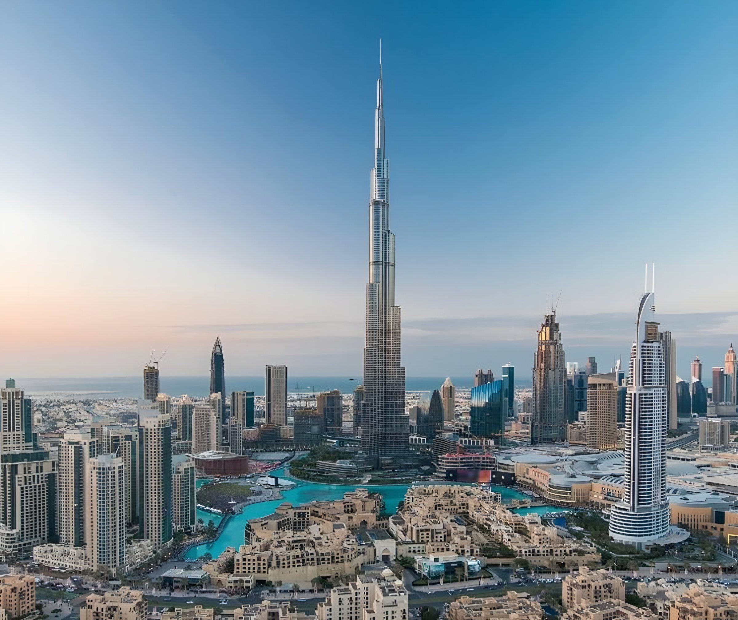 Burj Khalifa rising above Downtown Dubai at sunset